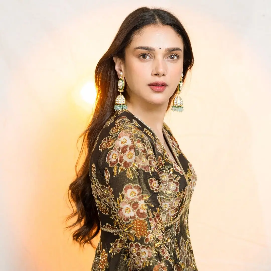 Hindi Actress Aditi Rao Hydari Stills In Green Designer Gown